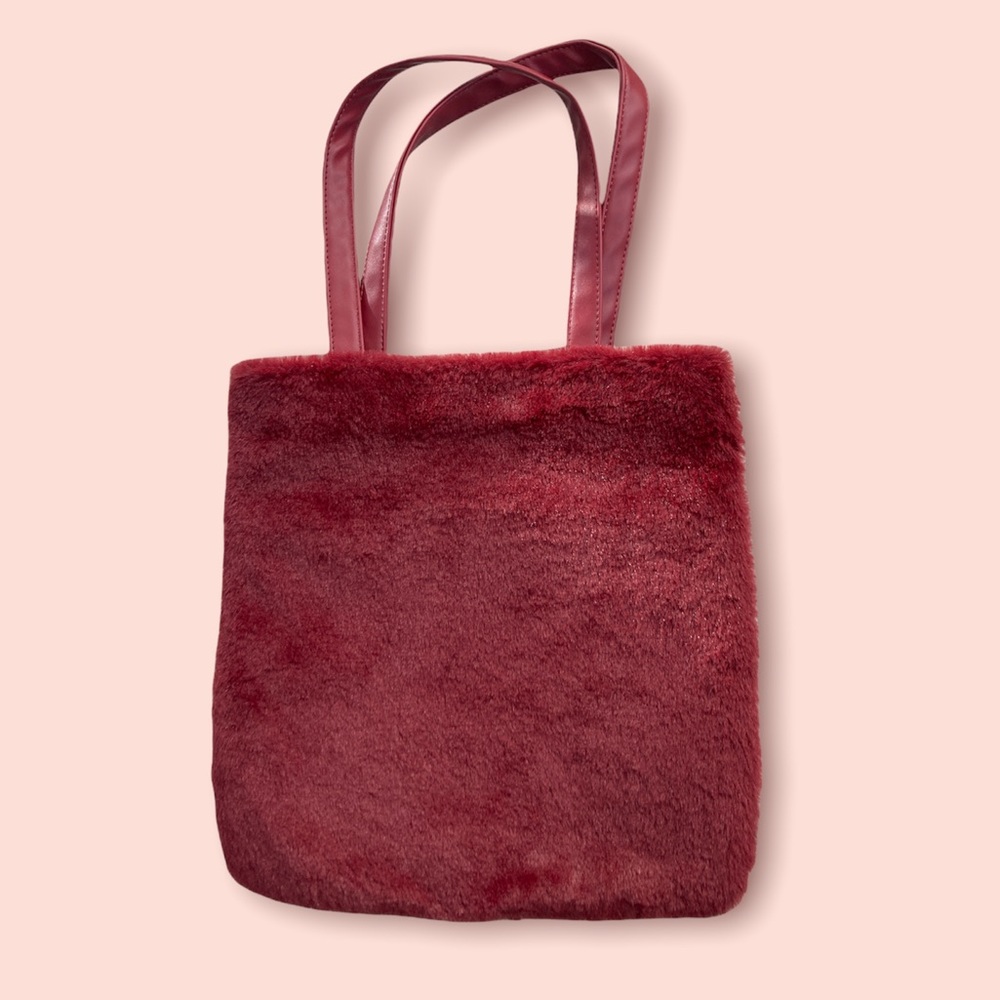 Super soft fuzzy burgundy tote bag. Never used